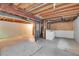 Unfinished basement with exposed beams and visible ductwork at 9946 Harrison St, Thornton, CO 80229
