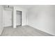 Clean bedroom features a closet, and a door to the hall at 9946 Harrison St, Thornton, CO 80229