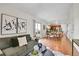 Open-concept living area showcasing modern decor and access to the outdoor space at 9946 Harrison St, Thornton, CO 80229