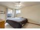 Inviting bedroom with a peaceful view from the window, offering a serene and comfortable atmosphere at 1348 Lawson Ave, Erie, CO 80516