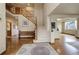 Grand foyer with a staircase, hardwood floors, and ample natural light at 1348 Lawson Ave, Erie, CO 80516