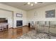 Comfortable living room with fireplace, hardwood floors, and recessed lighting at 1348 Lawson Ave, Erie, CO 80516