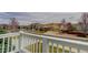 View from the balcony, showcasing the neighborhood, well-maintained lawns, and multiple car driveways at 1348 Lawson Ave, Erie, CO 80516