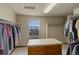 Large walk-in closet with built-in storage, window with mountain views and natural light at 1348 Lawson Ave, Erie, CO 80516