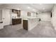 Finished basement bar area with tile floor, under-counter refrigerators, and wine rack at 3427 S Cherry St, Denver, CO 80222