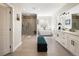 Elegant bathroom featuring a glass shower, soaking tub, and dual vanities at 3427 S Cherry St, Denver, CO 80222