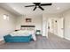 Spacious bedroom with a ceiling fan and ample natural light at 3427 S Cherry St, Denver, CO 80222
