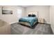 Bedroom features neutral paint, carpet, and a bed with stylish headboard at 3427 S Cherry St, Denver, CO 80222