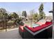 Outdoor deck features stylish lounge seating and a view of the backyard at 3427 S Cherry St, Denver, CO 80222