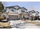 Charming two-story home featuring a well-manicured lawn and a spacious two car garage at 3427 S Cherry St, Denver, CO 80222