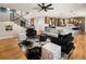 An interior shot of the open-concept living room, blending seamlessly with the dining and kitchen areas at 3427 S Cherry St, Denver, CO 80222