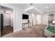 Finished basement boasts ample living space and storage options, plus easy access to utility room at 1865 S Logan St, Denver, CO 80210