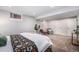 Spacious bedroom with neutral walls, carpet flooring and comfortable furnishings at 1865 S Logan St, Denver, CO 80210