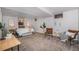 Spacious bedroom with neutral walls, carpet flooring, and comfortable furnishings at 1865 S Logan St, Denver, CO 80210