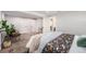 Spacious bedroom with neutral walls, carpet flooring, and comfortable furnishings at 1865 S Logan St, Denver, CO 80210