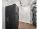 Convenient laundry room located off the kitchen includes modern appliances and storage solutions at 1865 S Logan St, Denver, CO 80210