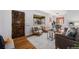 Bright living room with wood floors, natural light, stylish furniture, and decorative accents at 1865 S Logan St, Denver, CO 80210