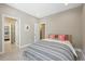 Bright bedroom with an ensuite bathroom, neutral tones, and an open layout at 8007 S Valleyhead Way, Aurora, CO 80016