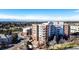 Spacious brick apartment complex with balconies and a mountain view at 4875 S Monaco St # 103, Denver, CO 80237