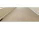 A bedroom with carpeted flooring and a wall vent at 23760 Broadmoor Dr, Parker, CO 80138