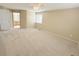 This bedroom features neutral walls and carpet, allowing for customization at 23760 Broadmoor Dr, Parker, CO 80138