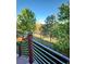View from the deck overlooking the surrounding trees and neighborhood at 23760 Broadmoor Dr, Parker, CO 80138
