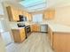 Bright kitchen featuring light wood cabinets, stainless appliances and countertops at 23760 Broadmoor Dr, Parker, CO 80138