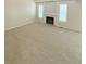 Cozy living room featuring a fireplace, large windows, and neutral carpet at 23760 Broadmoor Dr, Parker, CO 80138