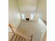 An aerial view of a large living room with a fireplace and neutral carpeting at 23760 Broadmoor Dr, Parker, CO 80138