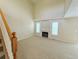 Inviting living room boasting a fireplace and an abundance of natural light at 23760 Broadmoor Dr, Parker, CO 80138