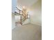 Inviting living room featuring a staircase and neutral carpeting at 23760 Broadmoor Dr, Parker, CO 80138