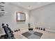A home gym featuring free weights, kettlebells, a mirror, and exercise mats at 1558 Wandering Way, Castle Rock, CO 80109
