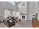 Comfortable living room with a fireplace and a neutral color palette at 1558 Wandering Way, Castle Rock, CO 80109