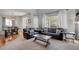Open living room with a hardwood floor and natural light at 1558 Wandering Way, Castle Rock, CO 80109