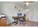 Office space with a wooden desk, chair, and a ceiling fan at 1558 Wandering Way, Castle Rock, CO 80109