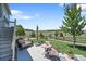 Enjoy a backyard patio with comfortable seating and scenic views at 8661 S De Gaulle Ct, Aurora, CO 80016