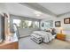 Bright main bedroom with a large window for natural light at 8661 S De Gaulle Ct, Aurora, CO 80016