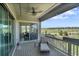 Covered patio with seating area and view of the community at 8661 S De Gaulle Ct, Aurora, CO 80016