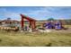 Community playground and picnic pavilion area next to the community pool at 14807 Haley Ave, Parker, CO 80134
