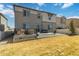 Large backyard featuring a patio with seating, ideal for outdoor gatherings and relaxation at 12759 Buffington Trl, Parker, CO 80134