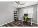 Home office in a bedroom with a desk and chair at 5332 Granby St, Denver, CO 80239