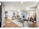 Finished basement featuring a living room area with recessed lighting and hardwood floors at 2890 S Sherman St, Englewood, CO 80113