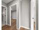 Open hallway with hardwood floors that connect multiple rooms at 2890 S Sherman St, Englewood, CO 80113