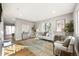 Bright and airy living room with hardwood floors, stylish furniture, and natural light at 2890 S Sherman St, Englewood, CO 80113