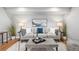 Cozy living room featuring a comfortable sofa, modern decor, and a neutral color scheme at 2890 S Sherman St, Englewood, CO 80113