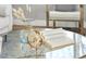 Artistic interior featuring a stylish glass coffee table with decorative elements, enhancing the living space at 2890 S Sherman St, Englewood, CO 80113