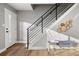 Modern staircase with sleek railings and contemporary decor, adding a touch of elegance at 2890 S Sherman St, Englewood, CO 80113