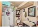 Compact bathroom with a shower stall, toilet, and vanity, offering basic amenities at 6033 Hoyt Ct, Arvada, CO 80004