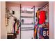 Walk-in closet with an organizer system, offering lots of space for storing clothes and accessories at 6033 Hoyt Ct, Arvada, CO 80004
