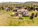 Expansive view of the property and surrounding neighborhood from above with a wood fence at 27 Tamarade Dr, Littleton, CO 80127